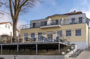 Гостиница Hotel am Wasserschloss Glücksburg  Глюксбург